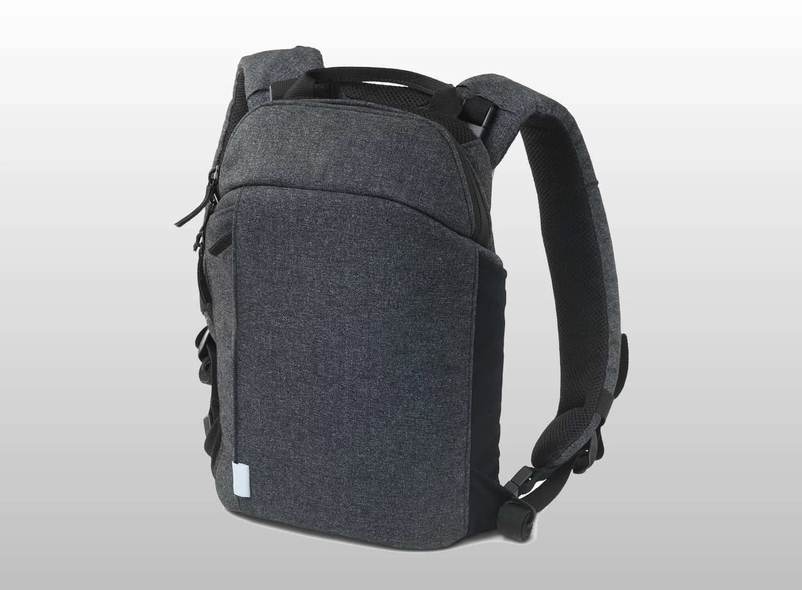 Woman with healthy back standing near a window showing good posture and well-being