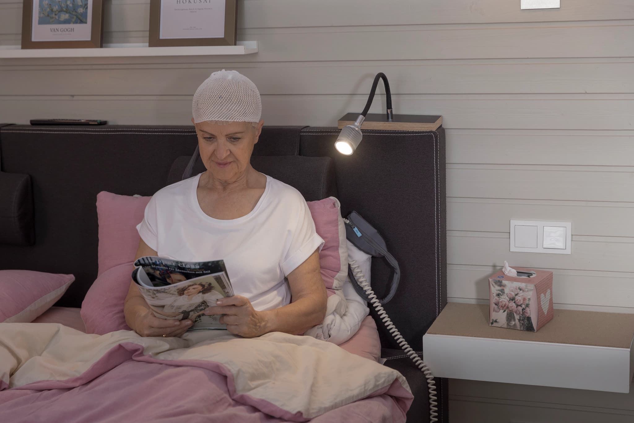 Christian Kasper holding a professional camera outdoors during a photo shoot